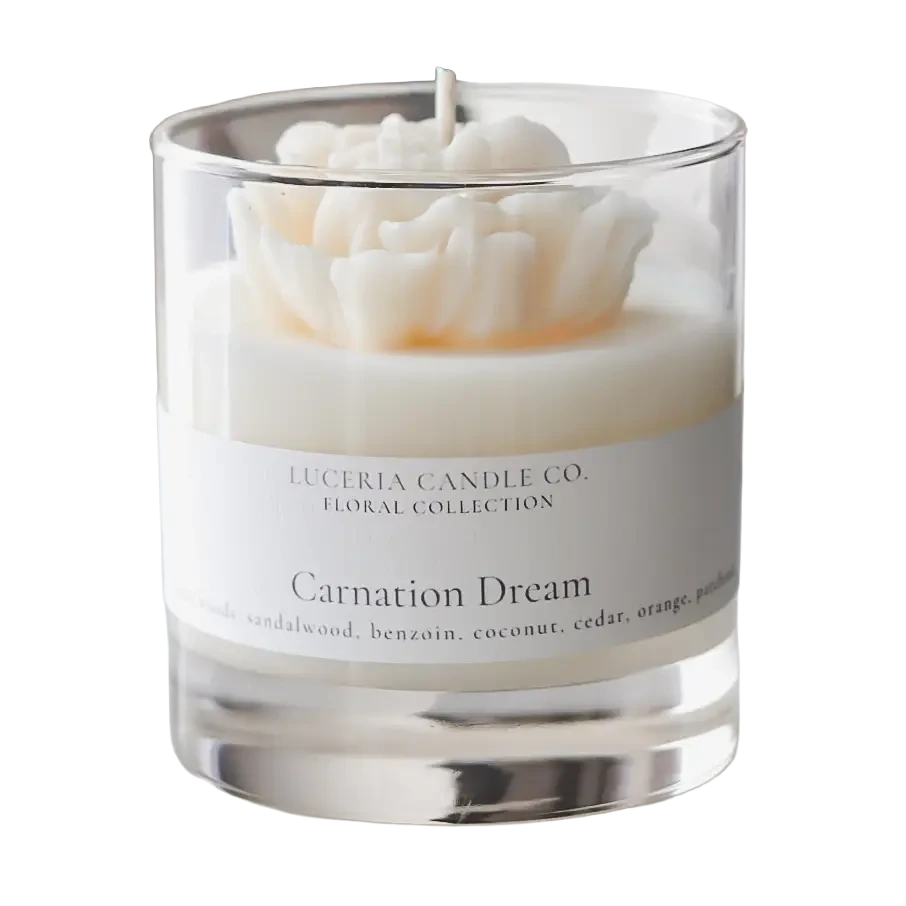 Luceria Carnation Dream candle in a glass vessel with soft floral packaging