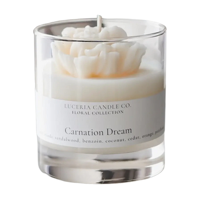 Luceria Carnation Dream candle in a glass vessel with soft floral packaging