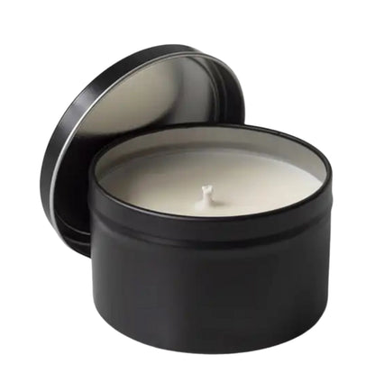 Small white tea scented candle in a 4oz jar with a personalized custom label