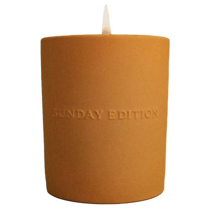 Sunday Edition Dawn candle with custom logo label on a white frosted jar