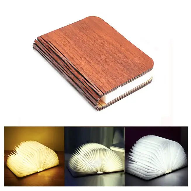 Wooden book-shaped night light glowing softly with personalized engraved text